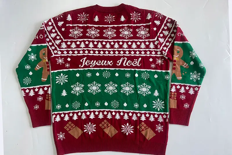 Folded cotton blend Christmas jumpers prepared with private label packing details