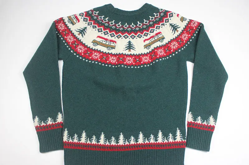 Folded wool blend Christmas jumpers prepared for premium private label seasonal retail